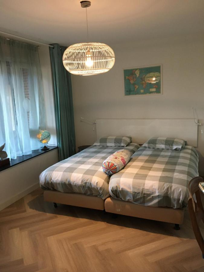 Strandhuis เอ็กมอนด์อานเซ ภายนอก รูปภาพ